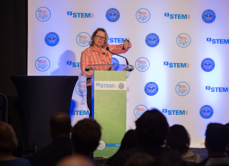 X-STEM Sponsor Logo on Screen and podium