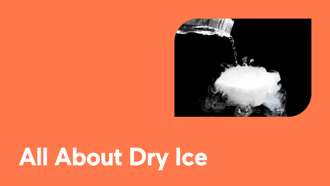 Liquid poured over dry ice creating smoky effect on black background.