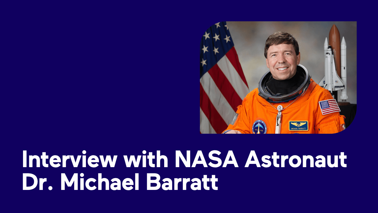 NASA astronaut in an orange spacesuit with an American flag background