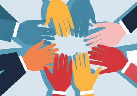 Diverse hands reaching into a circle, symbolizing unity and collaboration.